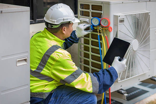 Professional Hvac technician working in Corcoran, CA